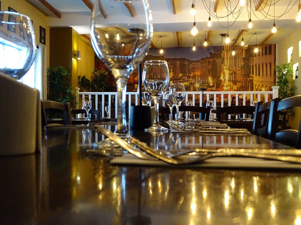 Warm restaurant interior with candlelit dining